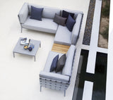 Conic modular corner sofa with box table